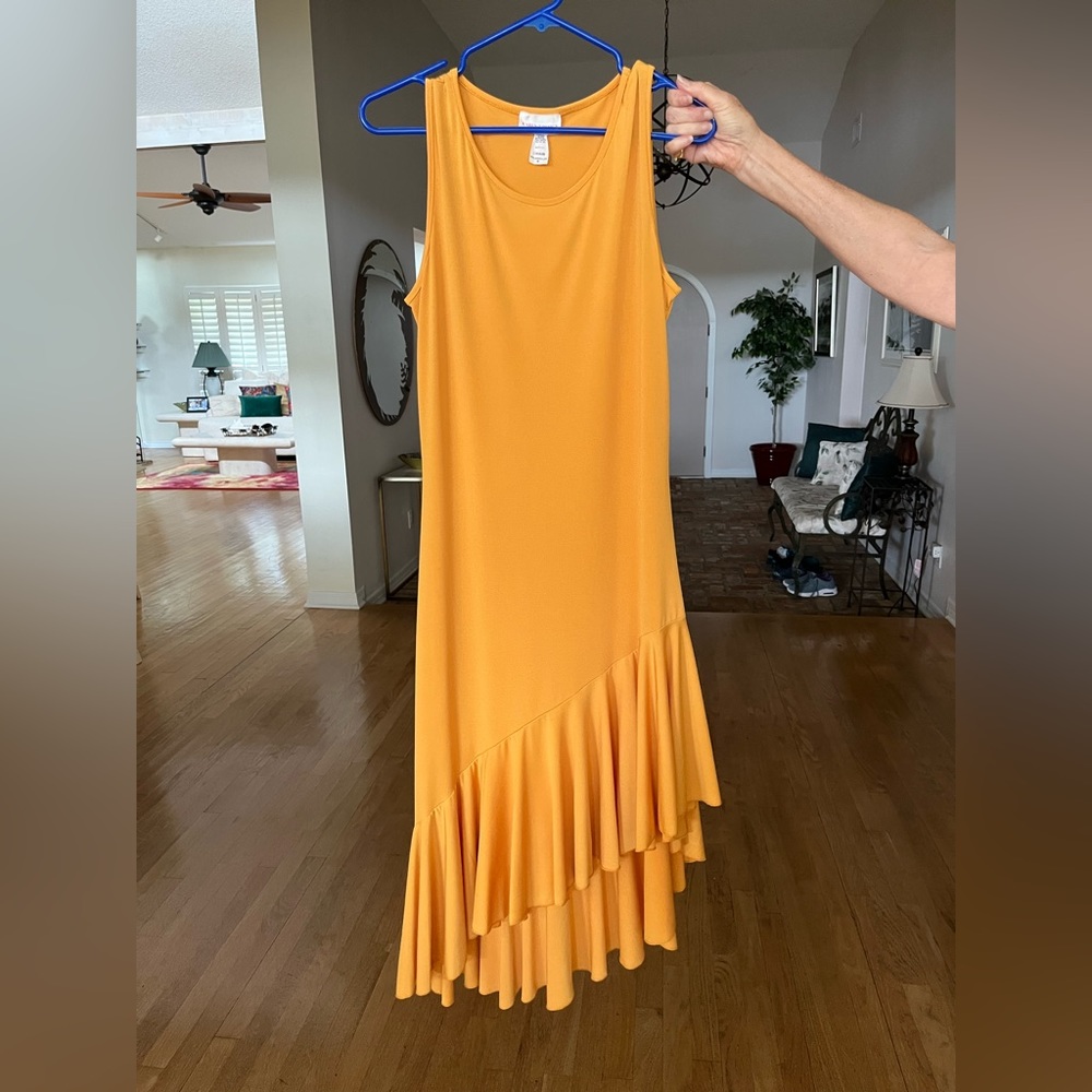 Yellow dress that can be used for elegant or casual attire.